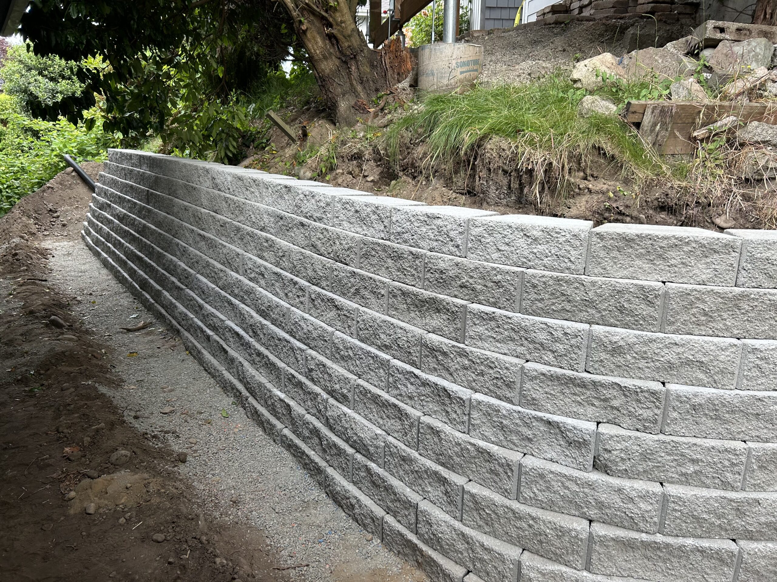 a gray brick retaining wall